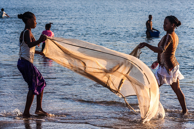 Women fishing bichiques in Antalaha