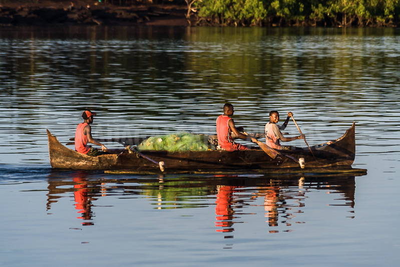 Boatmen at departure for fishing, Nosy Faly (Nosy Be)