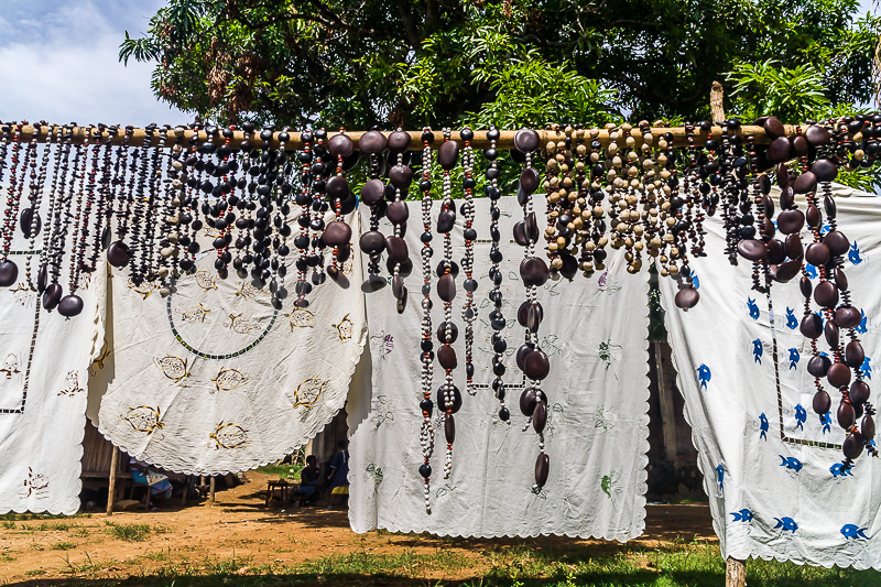 Embroidered tablecloths and seed necklaces, Nosy Komba (Nosy Be)
